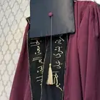 روب تخرج بلون العودي مع طاقية