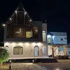 شالية مع مزرعة وجلسات خارجية