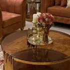 طقم طاولات حديد ذهبي مع زجاج بني