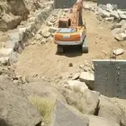 بناء حجر بوكلين وقص ارآضي الطائف وضواحيه