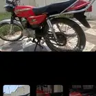 سوزوكي ax100