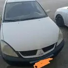 متسبوبيشي لانسر 2007 قير عادي استمارة مطوفه 3 سنوات فحص منته