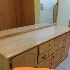 دولاب بوفيه ولوحات حائذ وقدر ضغط وساعة وطاولات وعلب دهن عود