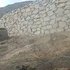 بوكلين لبناء الحجر وقص الاراضي وهدم العمائر القديمه