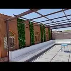 وجايه بديل الخشب مع مظلات ونوافير وشلالات عشب