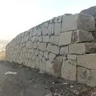 بوكلين لبناء الحجر وقص الاراضي وهدم العمائر القديمه