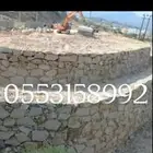 بكلين لقص الأراضي وبنيان الحجر وهدم العماير