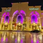 رسم اسماء العرسان بالليزر   على مباني القاعات والقصور