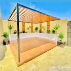 تنسيق حدائق وشلالات وجلسات وغرف زوجاج خارجية