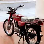 دباب سوزوكي اكس 100 AX100