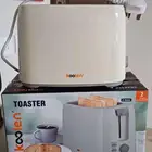 فرن كهربائي وجهاز توست