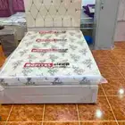 Complete bedroom with beds mattresses dressing tables and wa