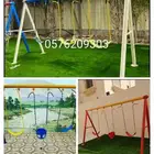 في كوميدينا. طاوله في. شاشه. مرجيحه المطاطه زحليقه