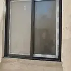 باب المنيوم شبابيك المنيوم دبل زجاج دبل سواتر مظلات هناجر