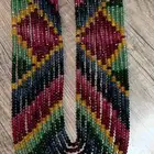 عقد نسائي من احجار الزمرد والياقوت والزفير