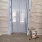 تقفيل تكسيات تلبيس ديكورات وبراويز استيل حول ابواب المصاعد