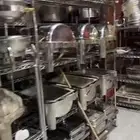 صحون وسخانات وسفنديشات وسواكل. وكاسات كلها جديده