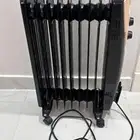 دفاية زيت كهربائية شبه جديده