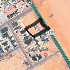 ارض تجارية مميزة حي الرمال على طريق رئيسي