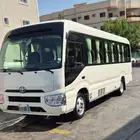bus coaster for rent with driver