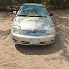 س كورولا 2003 عادي مصدومة من الخلف مع لوحة مميزة للبيع