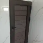 تفصيل ابواب المنيوم شبيه الخشب اناقه وروعه وسريعه الاستخدام