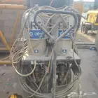 مضخة رش دهان صناعية من طراز Graco Xtreme.