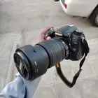 كاميرا نيكون 7000d نظيفه شبه جديده معه عدسه زوم