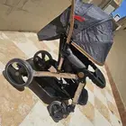عربة أطفال جديدة
