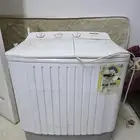 غسالة نص 200 ريال