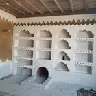 نعمل في مجال التراث الشعبي الحجر الطبيعي الخشب والجراد