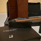 تصفية قطعتين دنهل محفظة جلد نعام ومضرب قولف دنهل اصلي فنتج