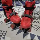 حذاء تزلج 4 عجلات أحمر مقاس 35-38