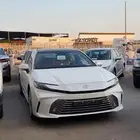 تويوتا كامري GRANDE أبيض موديل 2025