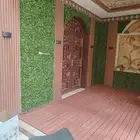 عشب صناعي وجلست خارجيه وتنسيق حدائق