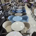 كرسيين وطاوله كافي