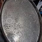 صينيه عليها ختم فضه حره ما ادري عنها اذا كانت مطليه او فضه خ