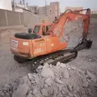 بوكلين لهدم المباني القديمه حفر برك وحفريات