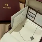 اسوارتين الاولى من AIGNER والثانيه من FAYENDRA