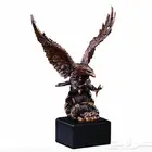 صقر مجسم لون برونز من البولى ريزن ابعاد 10X14 سم