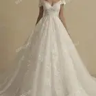 فستان زفاف نسائي يشبه الذي في الصورة