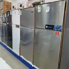 ثلاجات ثلاجه بابين باب واحد كبيره وسط ثلاجة صغيرة استيل ابيض