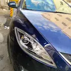 تغيير اغطيه شمعات على سياره مازدا2009