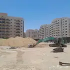 بوكلين لايجار حفر الاراضي وردمها وتوريد الصبيص والدبش