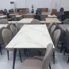 طاولات طعام رخام وكراسي جلد