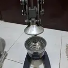 مكبس عصير برتقال يدوي