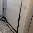 استند ملابس بعجلات