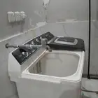 مغسلة ملابس للتقبيل