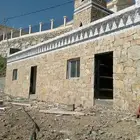 معلم حجر تلبيس وبنيان وربراب ارضي وممرات