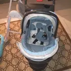 عربيه أطفال مع مقعد للسياره مواليد